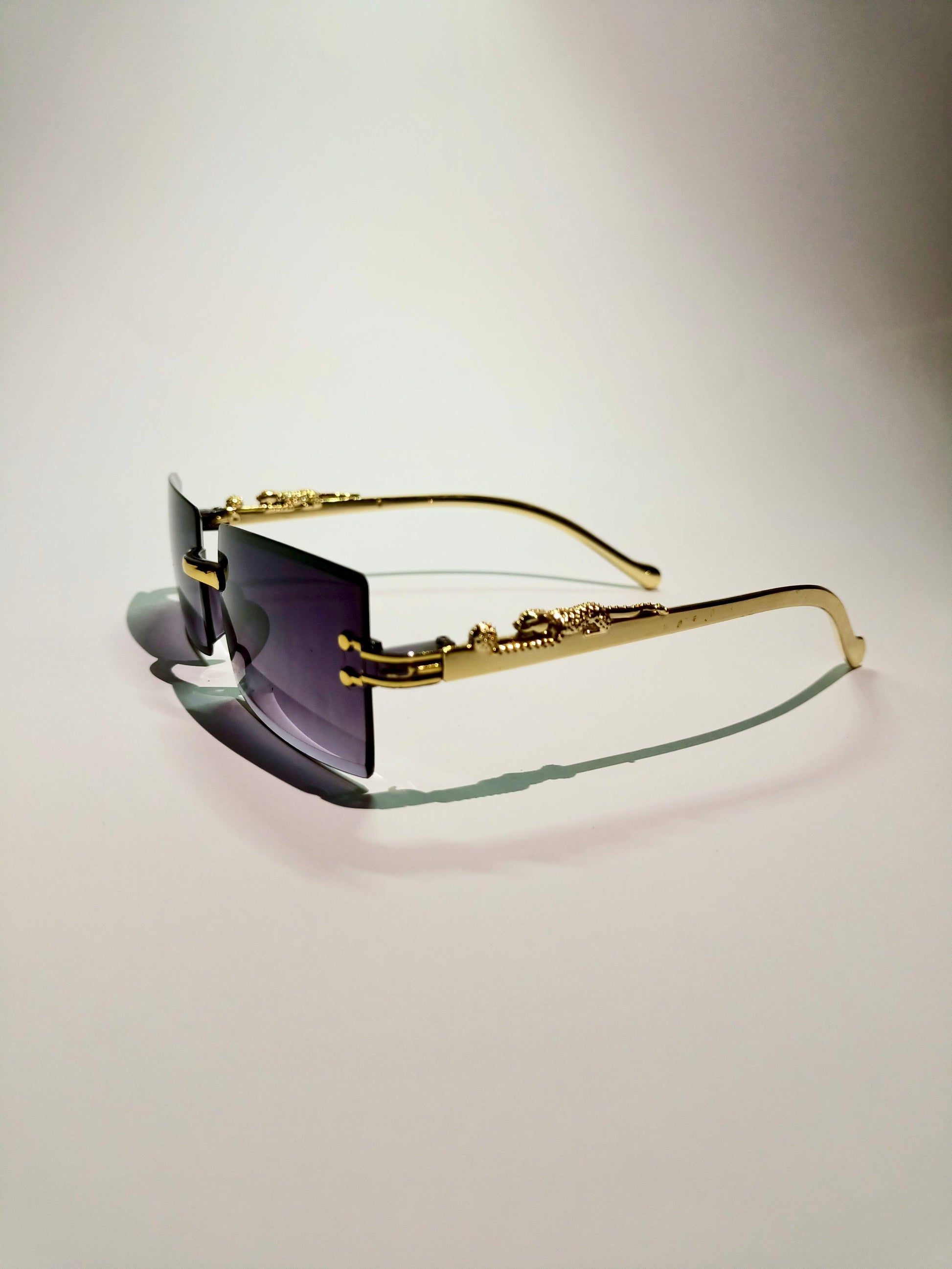 Cartier Luxury Gold-Trimmed Sunglasses – Purple Rimless Fashion Eyewear for Men & Women - OpticZone